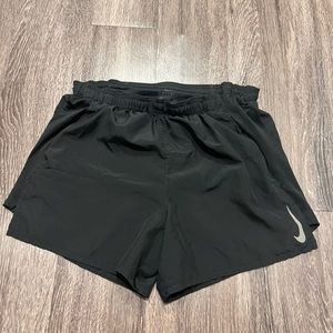 NIKE medium drifit 5 inch shorts